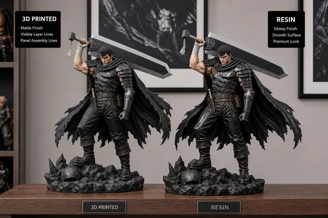 Two collector statues displayed side by side, one with a 3D printed matte finish and one with a smoother resin finish.