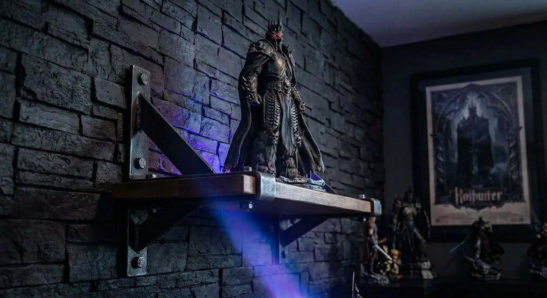 A large-scale 3D printed figure displayed on a heavy-duty wall-mounted shelf in dramatic, moody cinematic lighting against a dark textured wall.