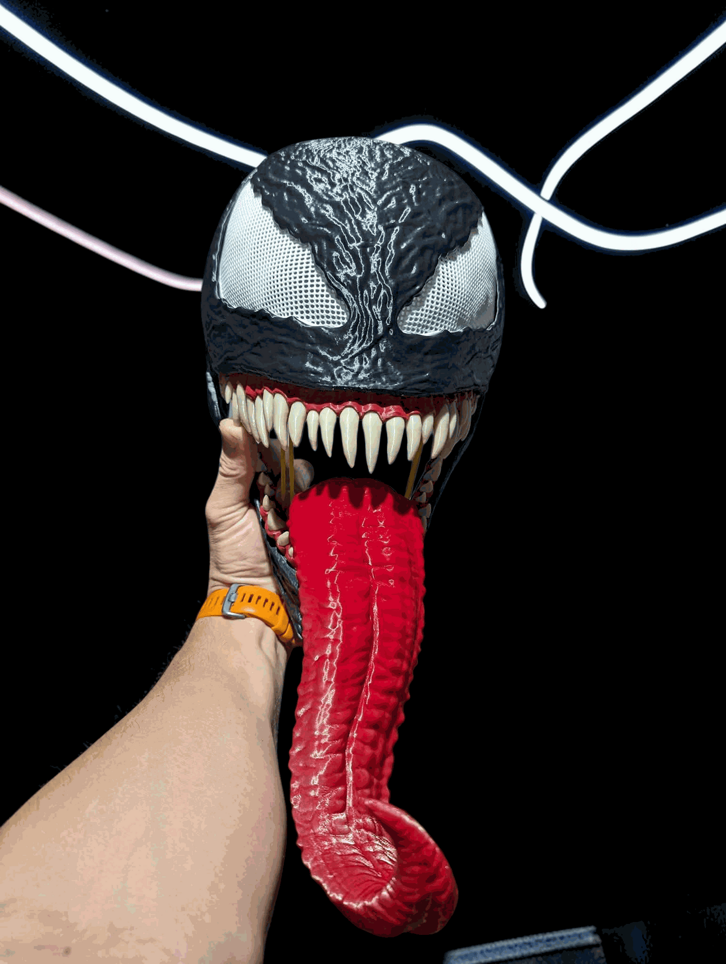 Venom mask helmet with movable jaw and white or beige teeth, fits heads up to 24 inches
