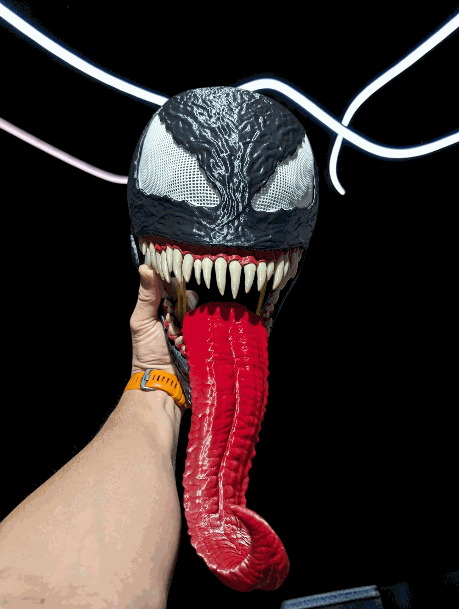 Venom mask helmet with movable jaw and white or beige teeth, fits heads up to 24 inches