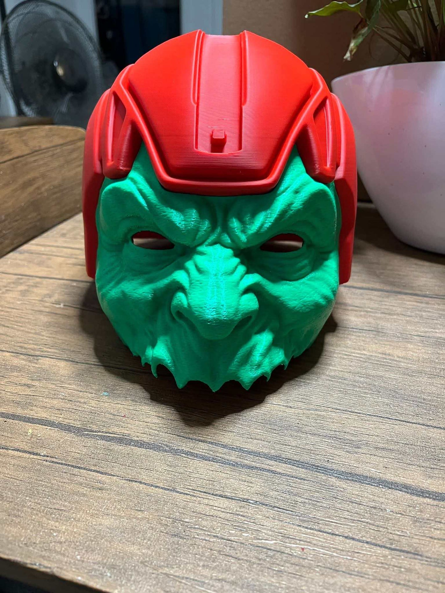 Trap jaw mask with magnets in light green, dark green, and squidward designs with pink helmets