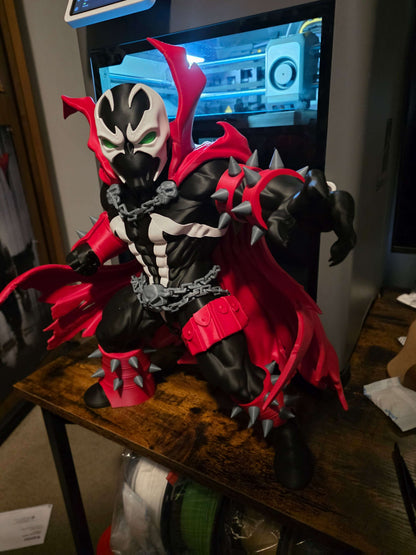 16-inch Spawn collectible figure with customizable grey or neon green chains and detachable cape pieces