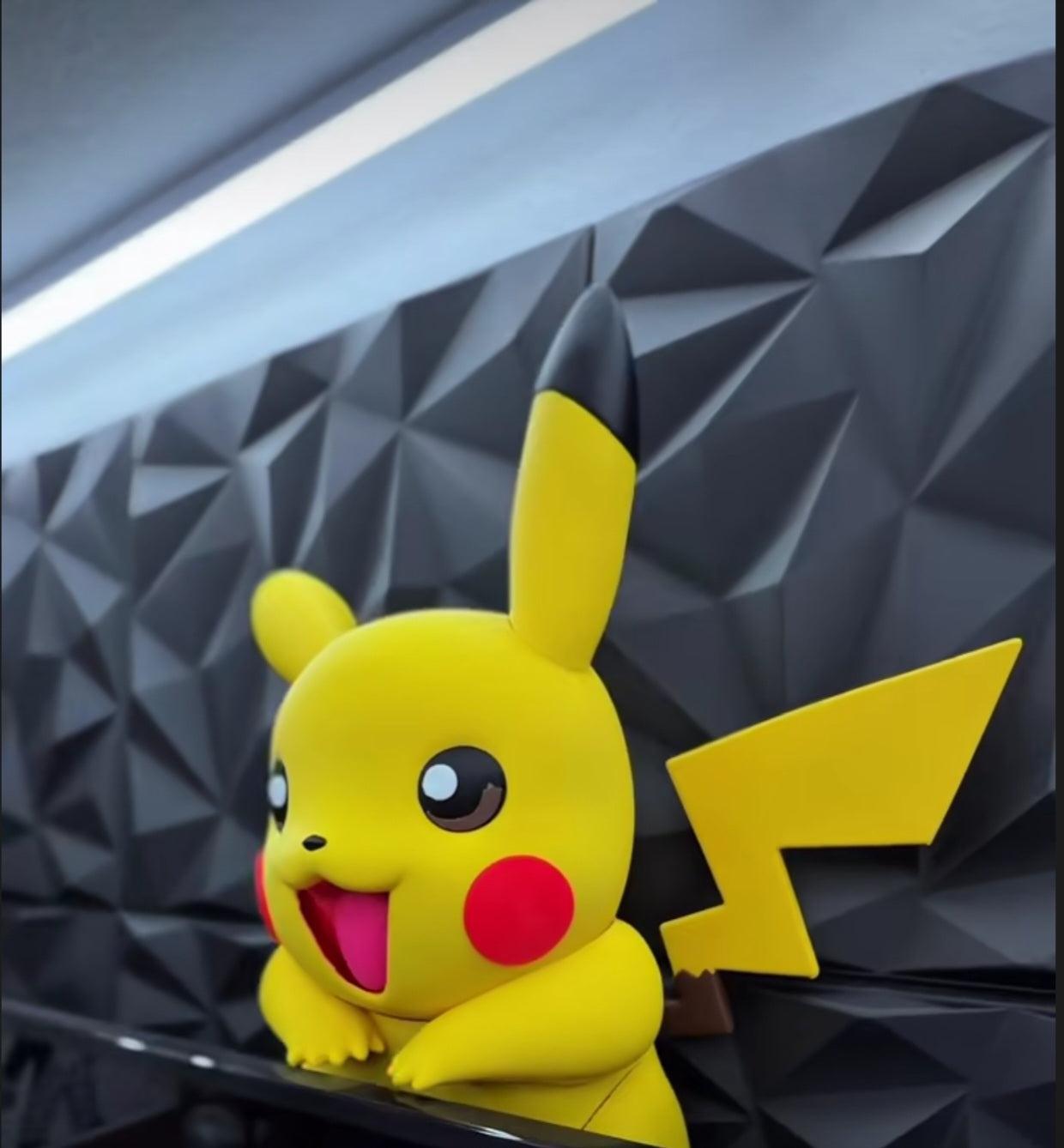 Pikachu screen buddy with stand pieces for full-size TVs 19"-100" mounted on TV back