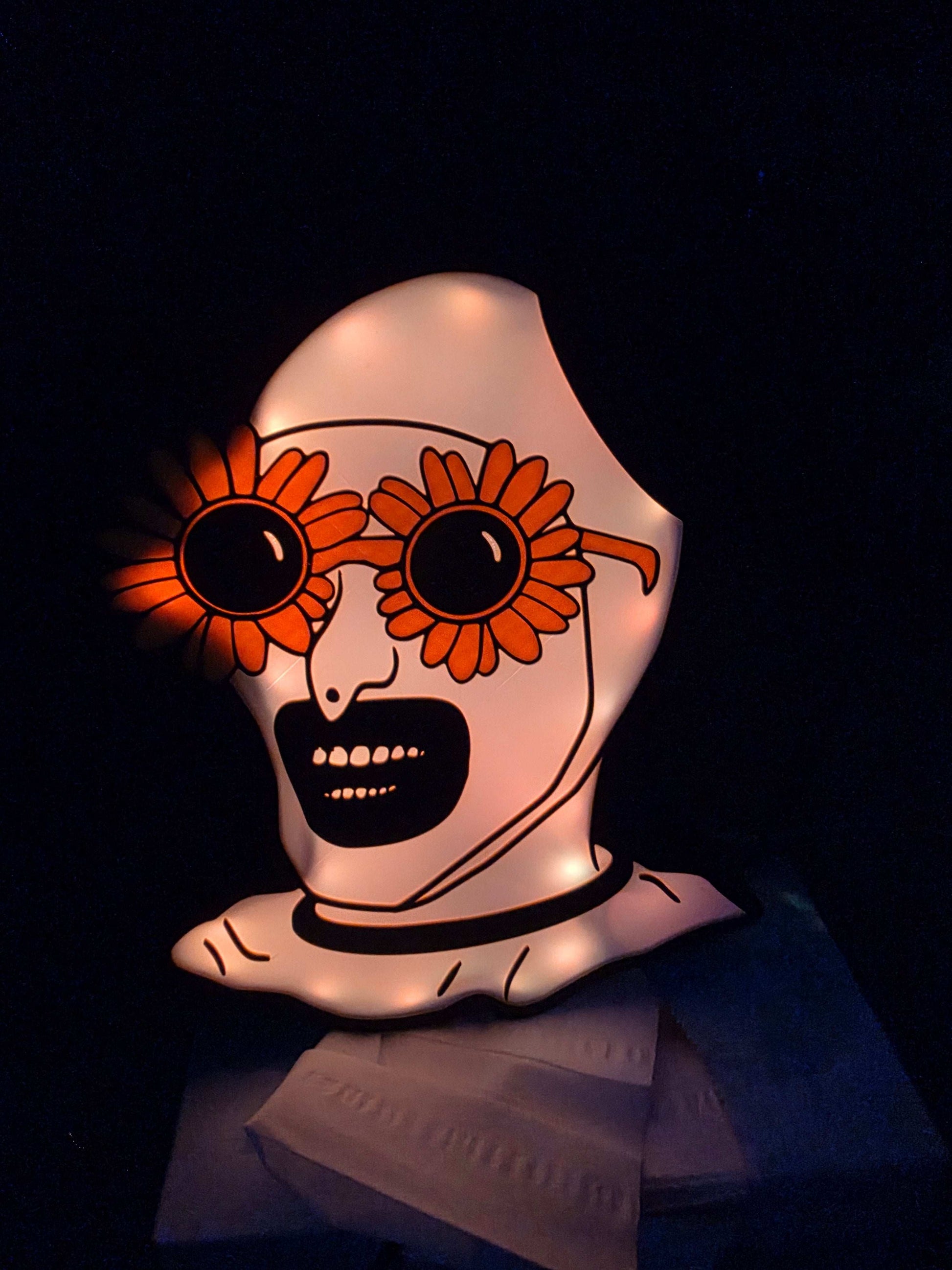 10-inch Terrifier Art the Clown lightbox with sunflower design and ONN LED remote