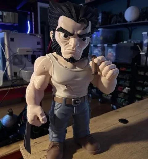 26-inch Logan Wolverine figure with glue-on claws and blue jeans holding a cigar