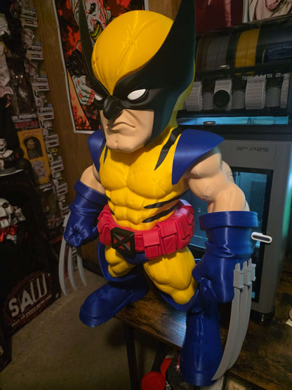 32-inch 1980s Wolverine collectible display piece with blue/red and black/brown suit variants