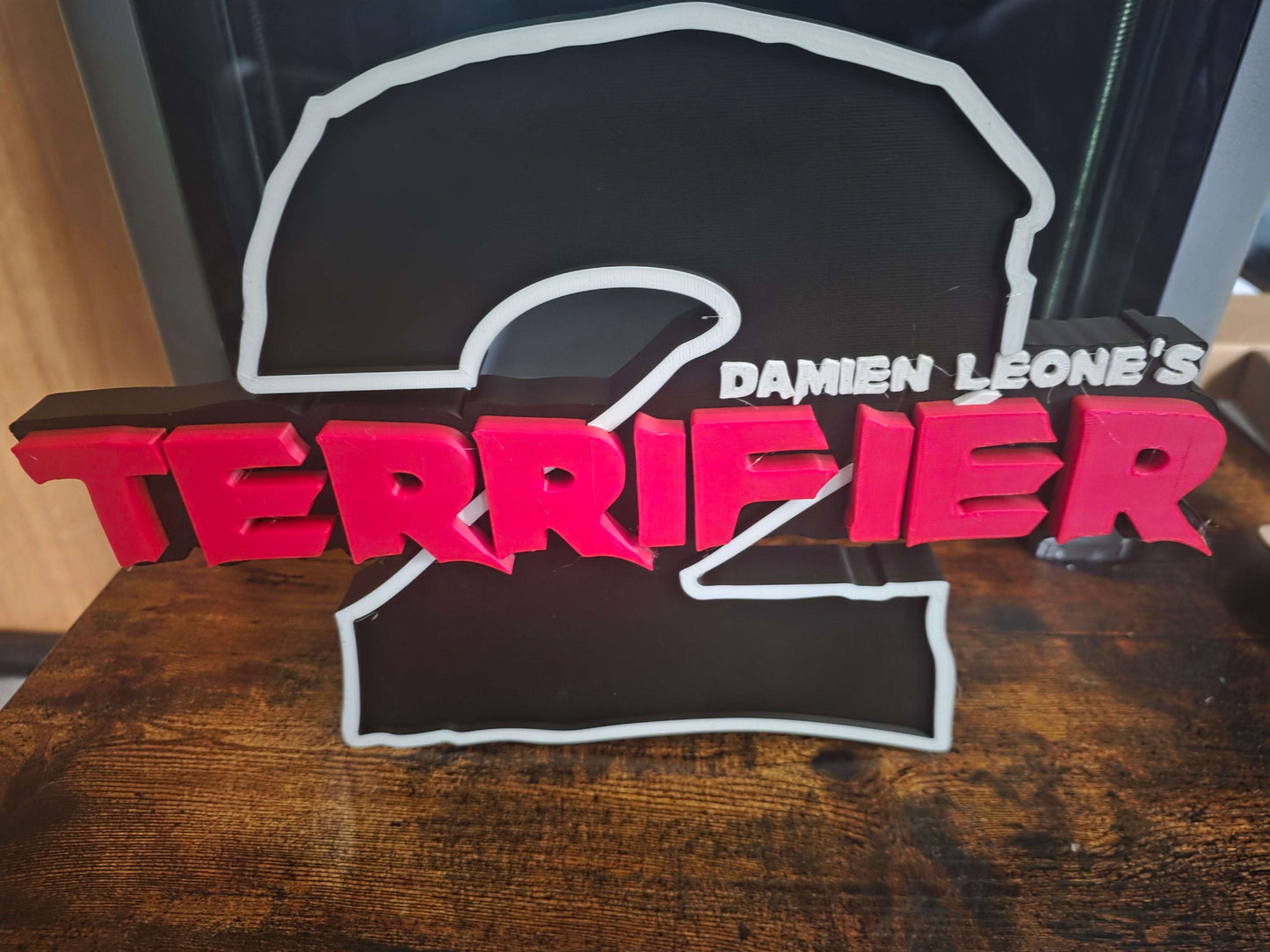 Terrifier 2 logo Art the Clown 12-inch horror prop with bold high-contrast design