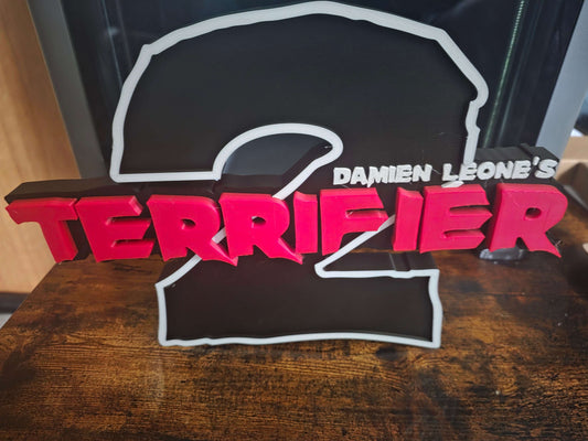 Terrifier 2 logo Art the Clown 12-inch horror prop with bold high-contrast design