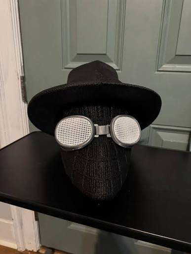 Spiderman noir mask with white goggles and black hat