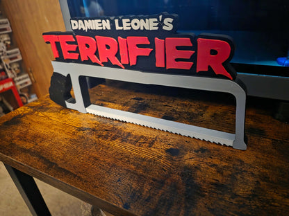 12 inch Terrifier horror logo prop with Art the Clown white saw design ready to ship