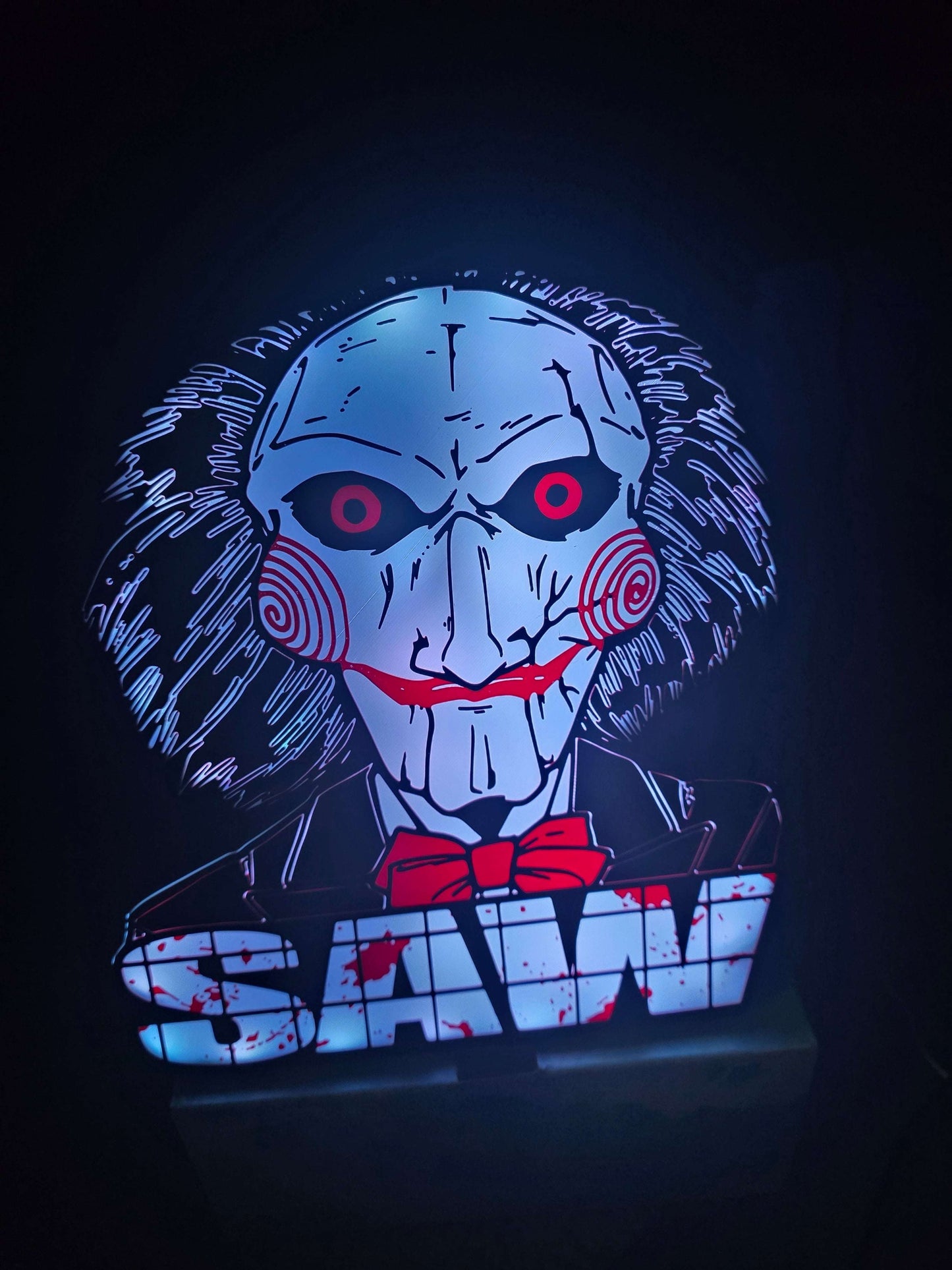 Large saw lightbox featuring Led Billy the Puppet from horror movie