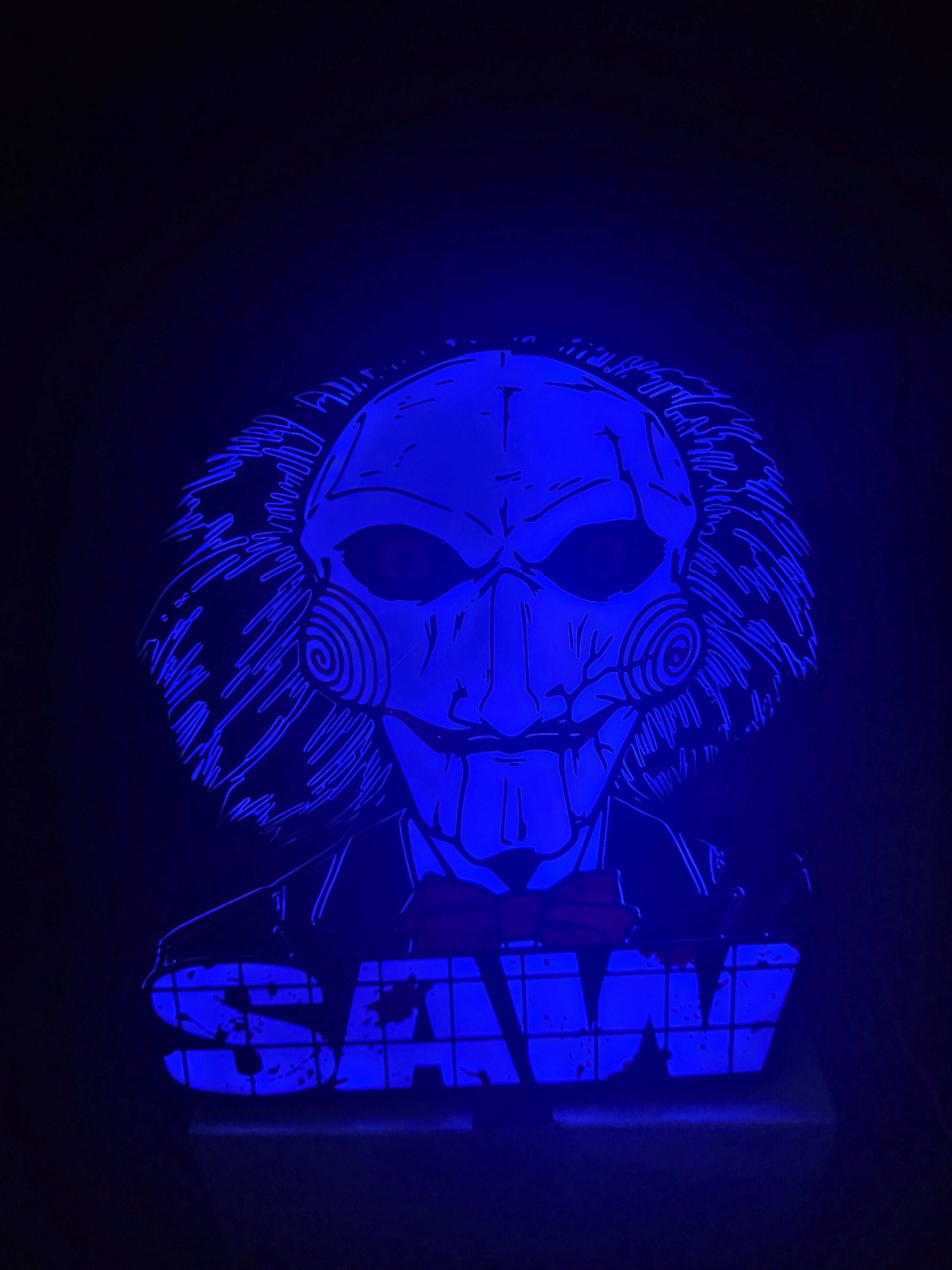 Large saw lightbox featuring ONN LED Billy the Puppet from horror movie Saw