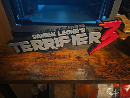 12-inch grey Terrifier 3 logo sign featuring The Clown motif for horror decor