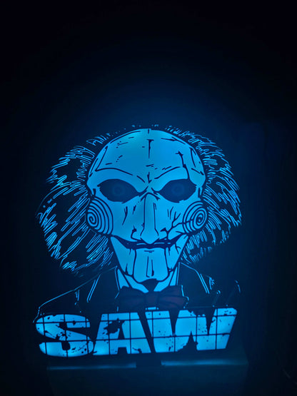 Large saw lightbox featuring ONN LED Billy the Puppet from horror series