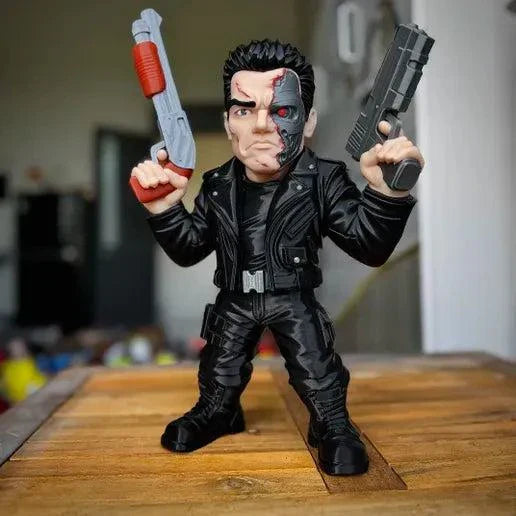 25-inch Terminator figure with fake guns requiring glue assembly for display