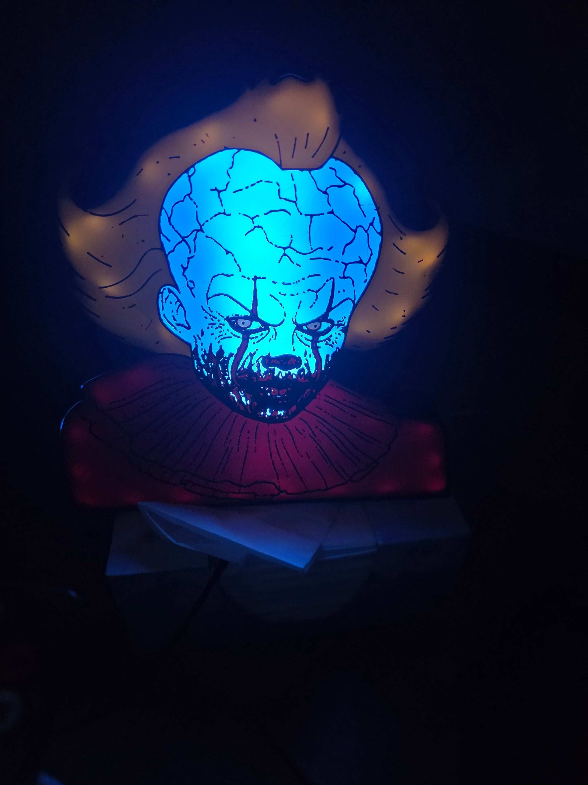 Pennywise 10" dancing clown lightbox glowing as a horror decor piece