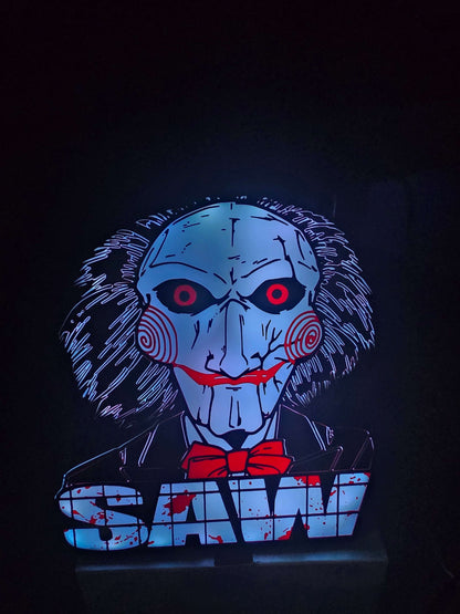 Large saw lightbox featuring ONN LED Billy the Puppet horror theme