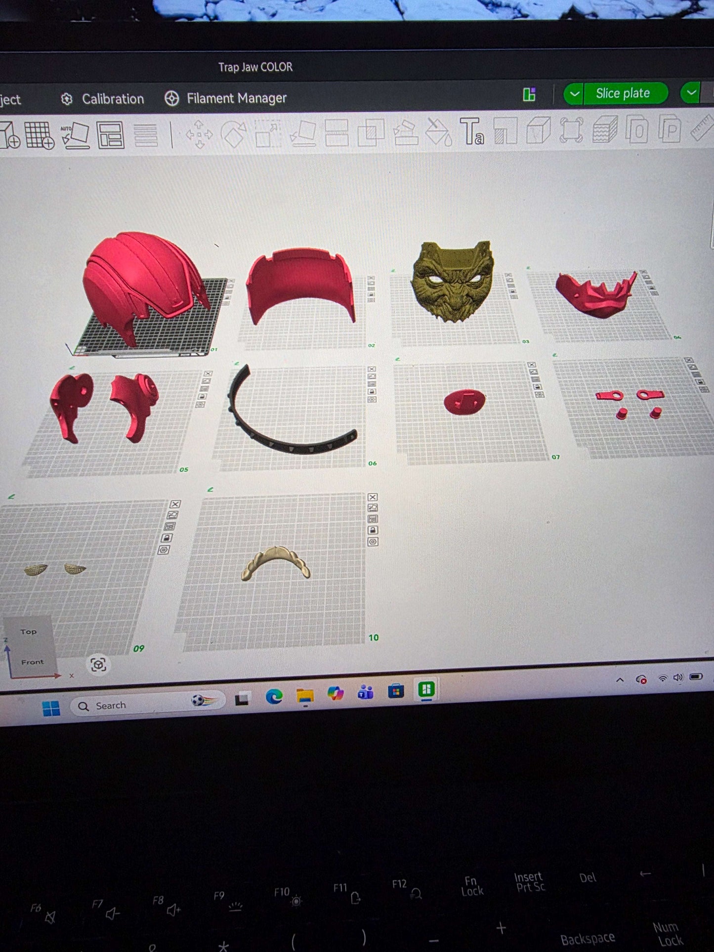 Trap jaw mask in light green, dark green, and squidward design with pink helmet and magnets