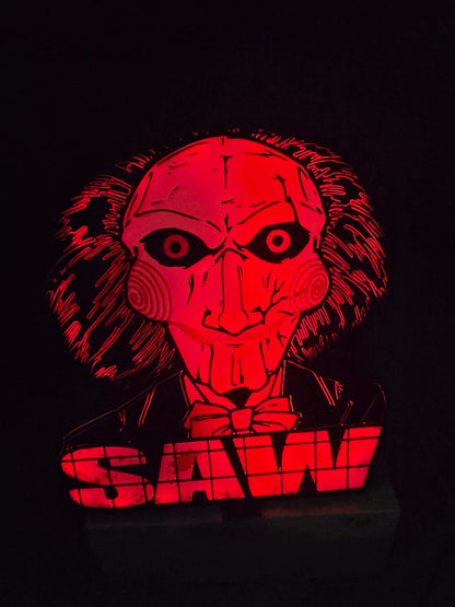 Large saw lightbox featuring ONN LED Billy the Puppet horror theme