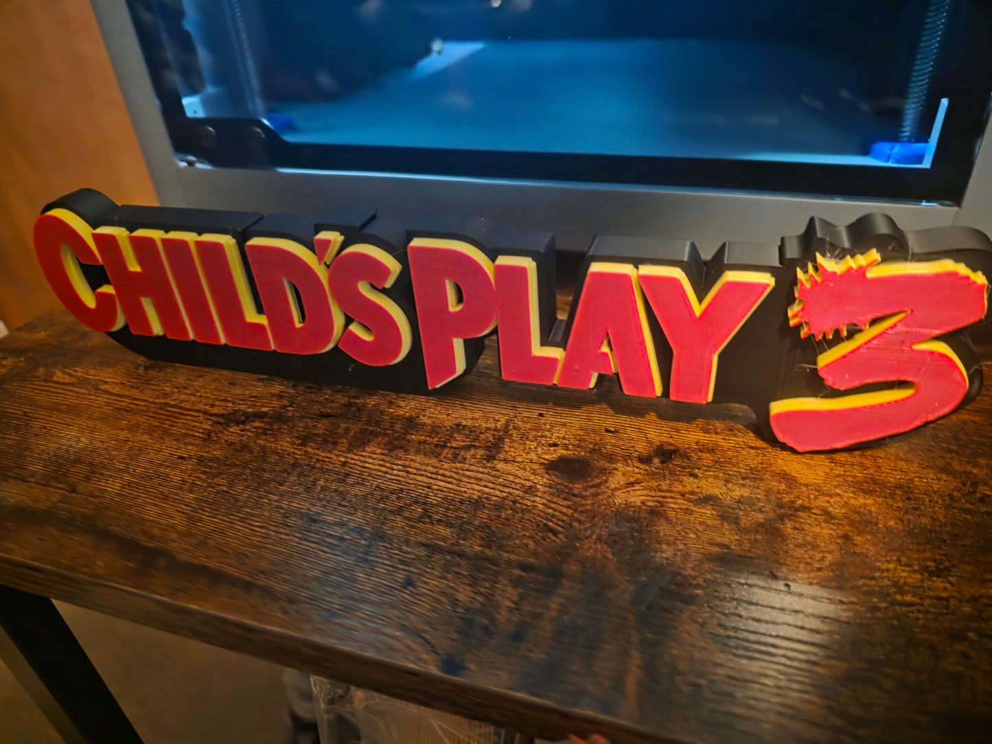 12-inch Chucky display figure from Child's Play 3 with black, red, and yellow accents