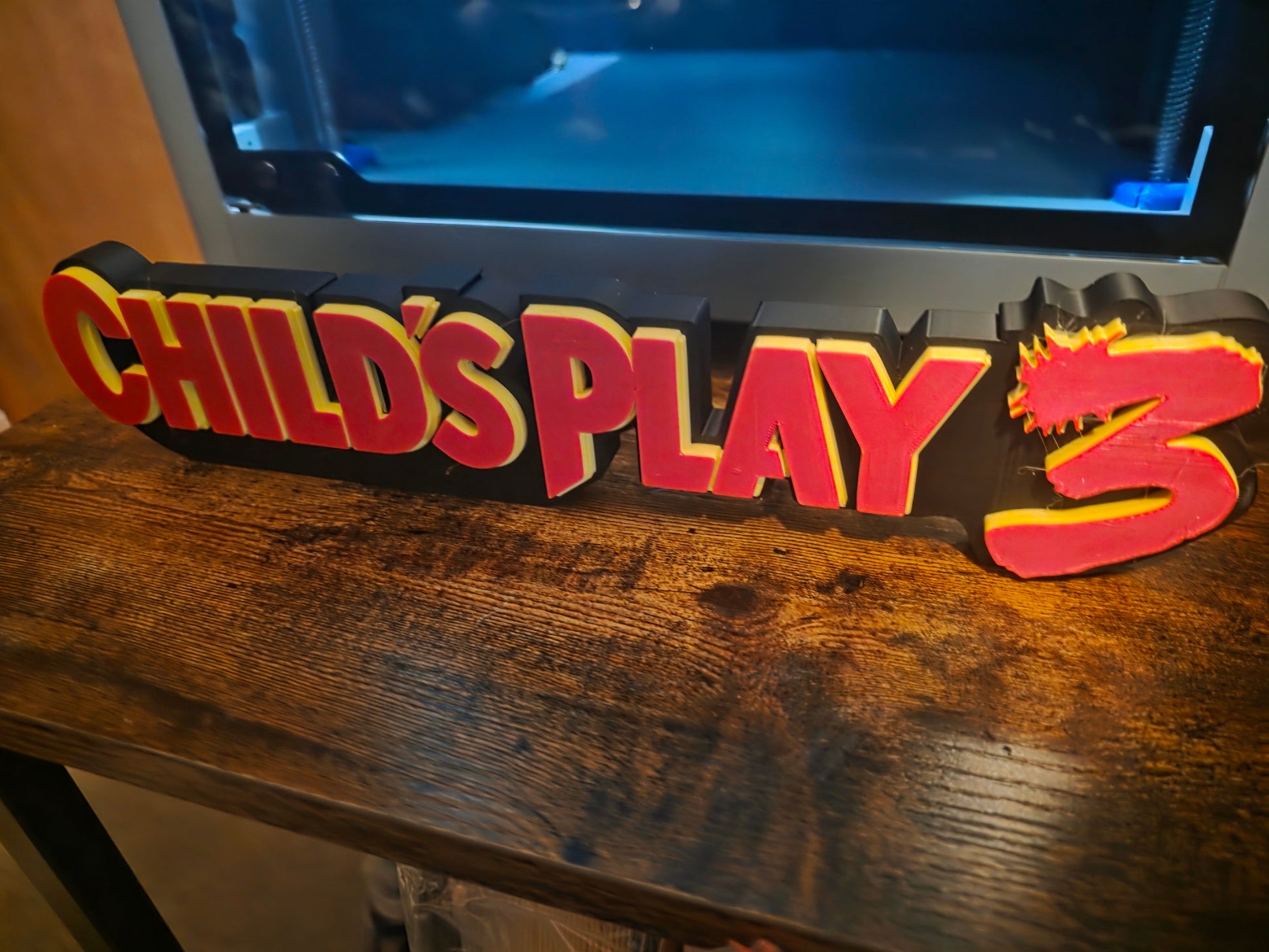 12-inch Chucky display figure from Child's Play 3 with black, red, and yellow accents