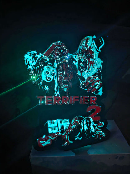 Terrifier 2 art lightbox featuring the clown in red blue white and black colors