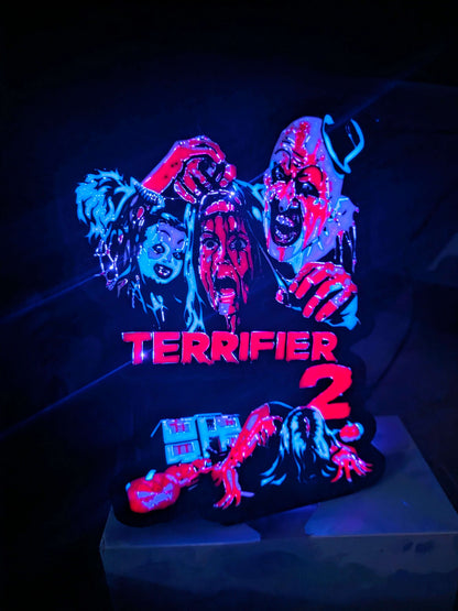 Terrifier 2 art of The Clown in blue red white black lightbox