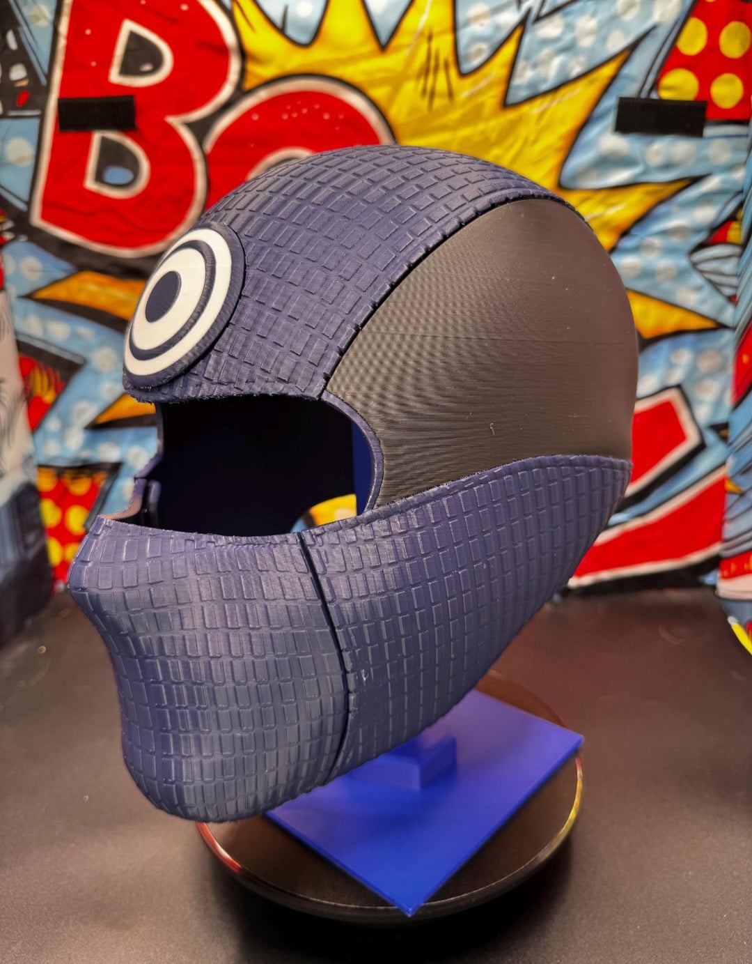 Bullseye vigilante full-head helmet mask with magnet-secured design and blue or black logo options