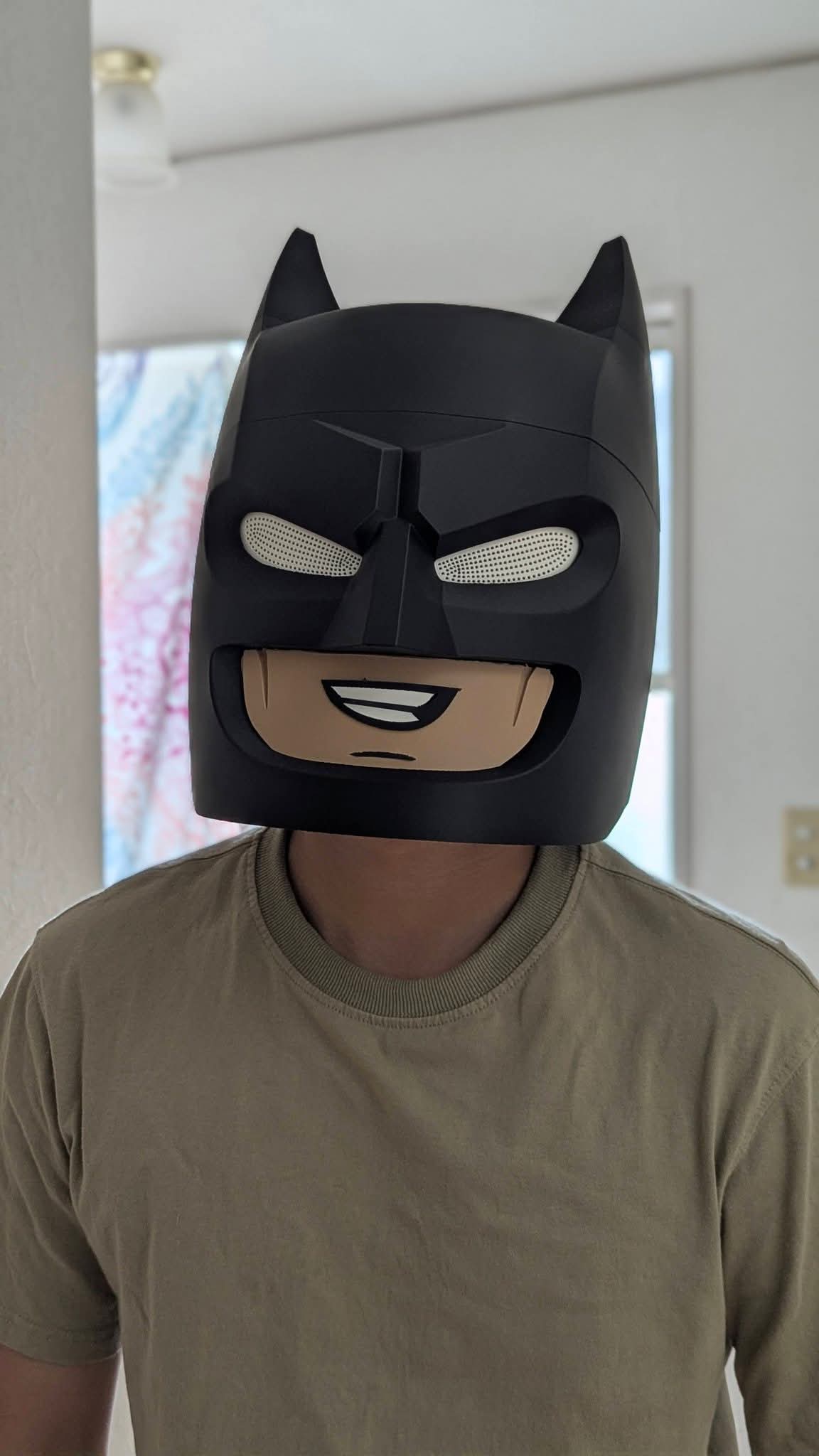 Full-size Lego vigilante mask with magnetic assembly inspired by Lego Batman design